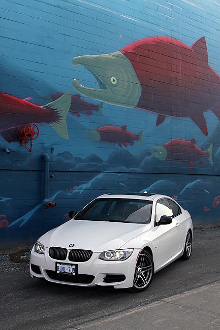 2011 BMW 335is Coupé white parked outside front view