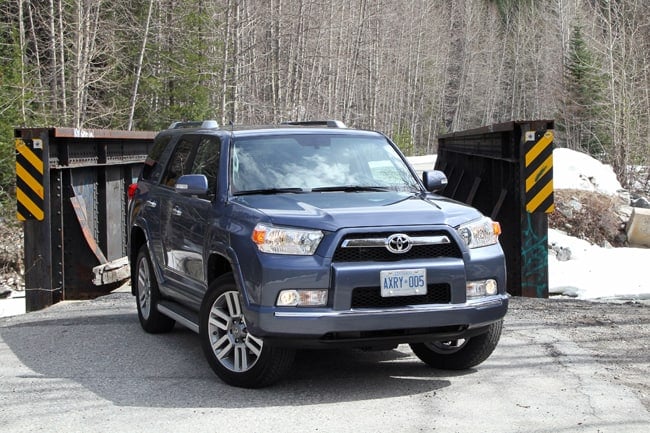 2012 Toyota 4Runner in blue front view parked on bridge