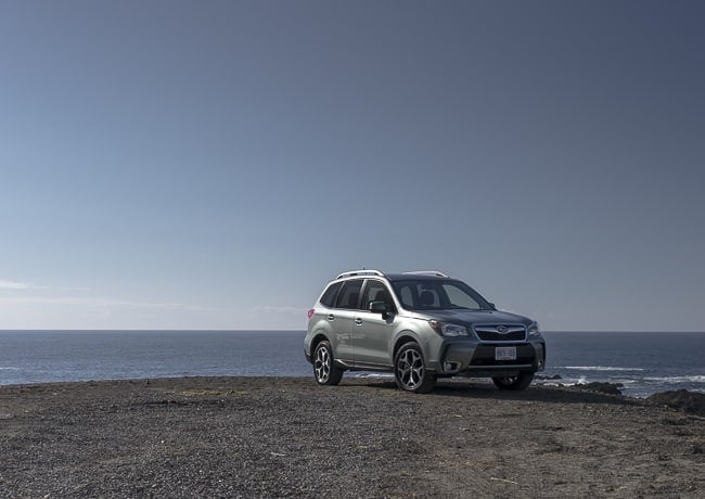 2014 Subaru Forester front parked on hill overlooking water