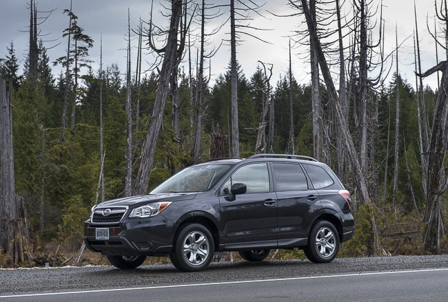 2014-Subaru-Forester-dark blue side view