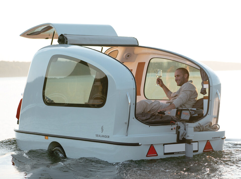 The Sealander RV with man inside on the water