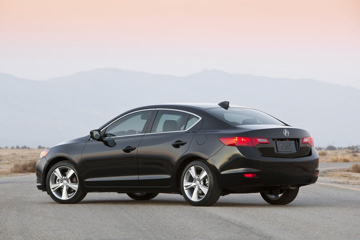 2015 Acura ILX Dynamic in black showing rear parked on street