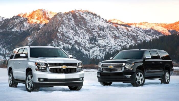 2015 Chevrolet Tahoe silver and black side by side front views