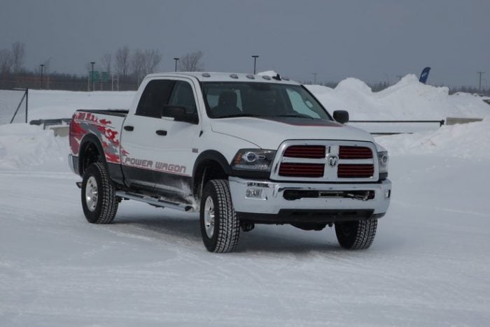 2015 Ram Power Wagon truck off roading in the snow, front view