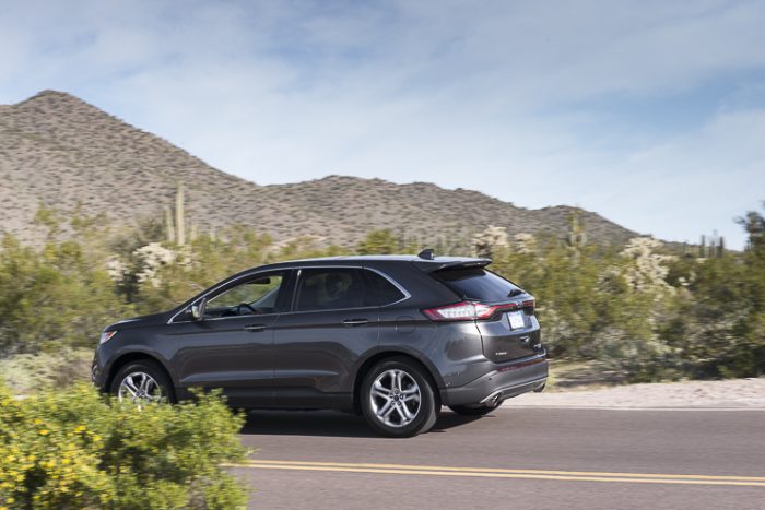 2015 Ford Edge Sport driving by
