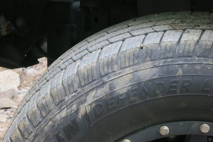 Michelin Defender LTX M/S tire sidewall and tread up close