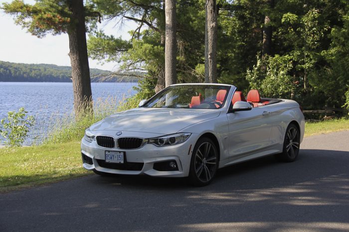 White 2015 BMW 435i Convertible front view with top down