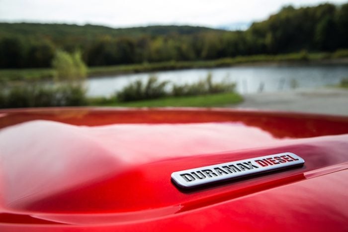 red 2016 GMC Canyon Diesel with Duramax diesel logo on hood