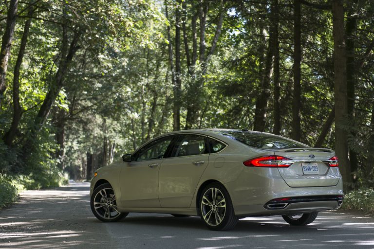 2017 Ford Fusion rear view parked on road