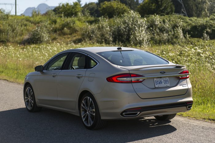 2017 Ford Fusion rear view parked on road