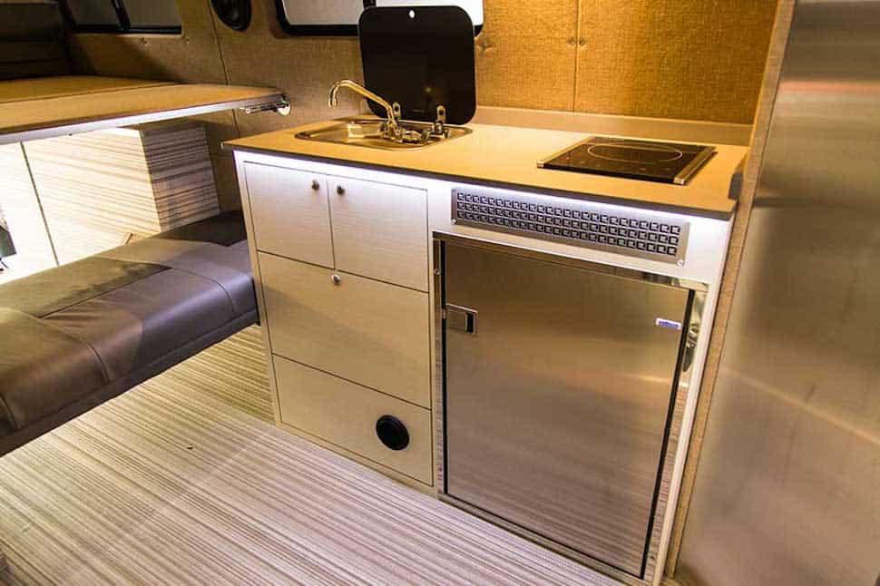 Outside Van Valhalla 4x4 Camper interior kitchen area