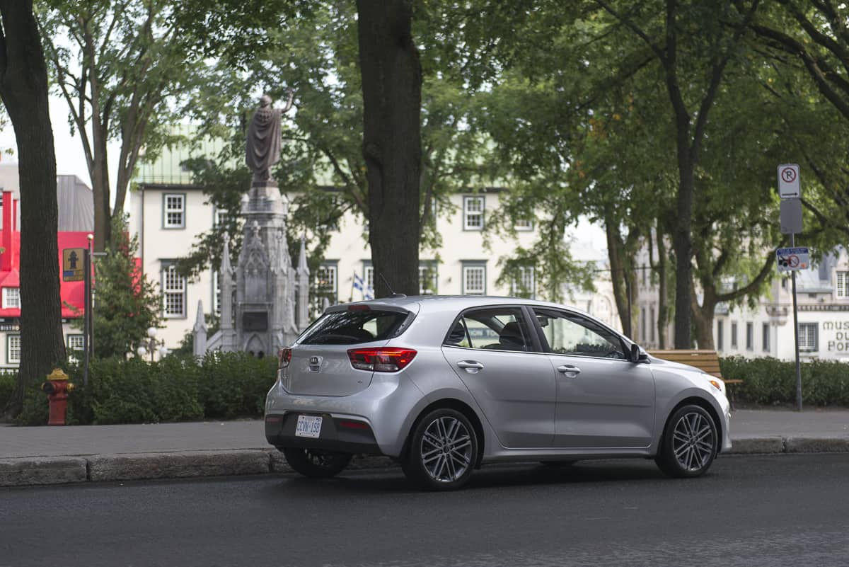 silver 2018 Kia Rio Hatchback rear shot parked on street