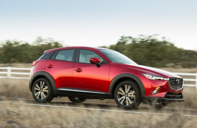 2018 mazda cx-3 review red driving sideview