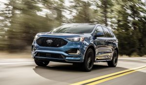 2019 Ford Edge ST driving fast on the road