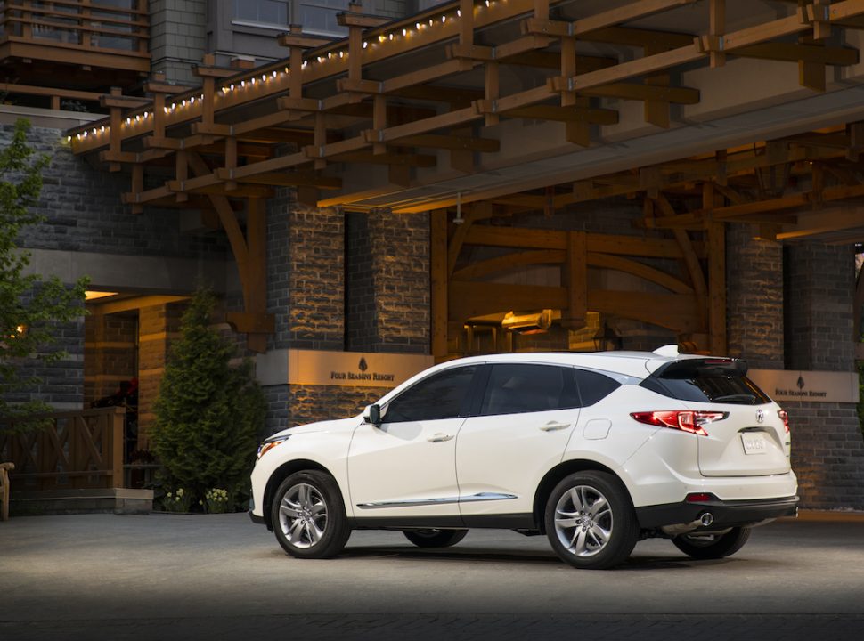 2019 acura rdx rear white parked in front of hotel