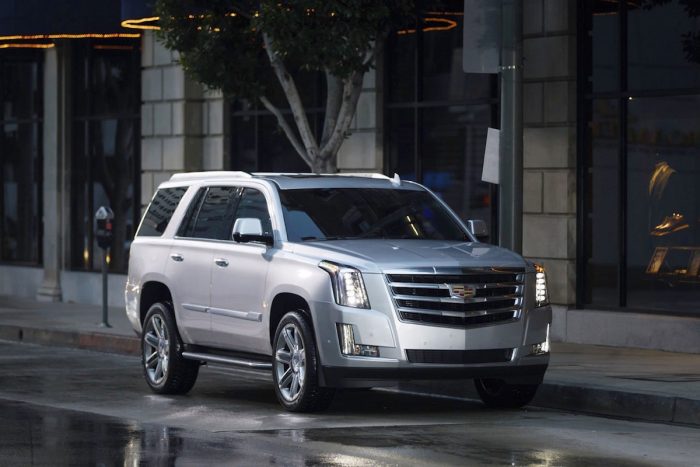 2018 Cadillac Escalade in silver parked on street