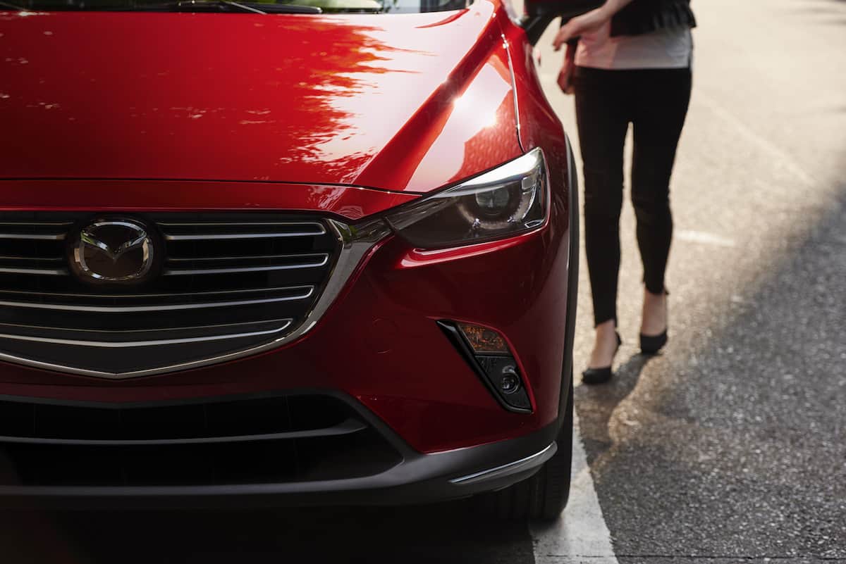 2019 Mazda CX-3 in red front headlight on street