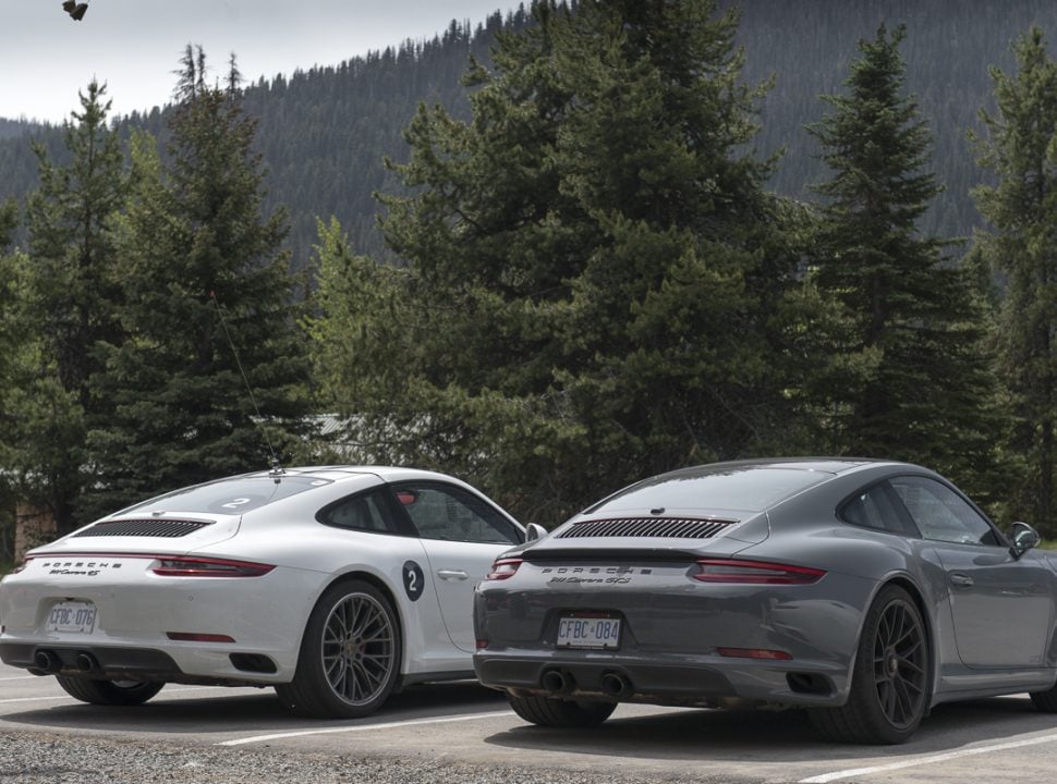 Porsche Travel Experience British Columbia Canada 911 4s and 911 GTS next to each other parked outside