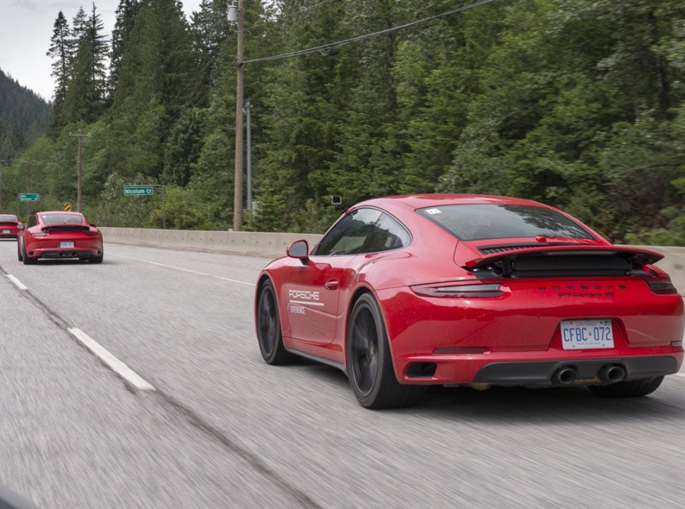 Porsche Travel Experience British Columbia Canada red 911 4S driving on the road