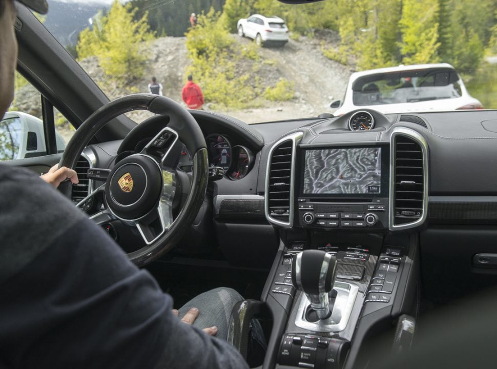 Porsche Travel Experience British Columbia Canada inside the Cayenne SUV while off roading