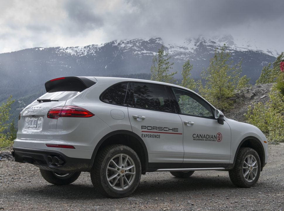 Porsche Travel Experience British Columbia Canada Wilderness Adventure tour in a white Cayenne SUV