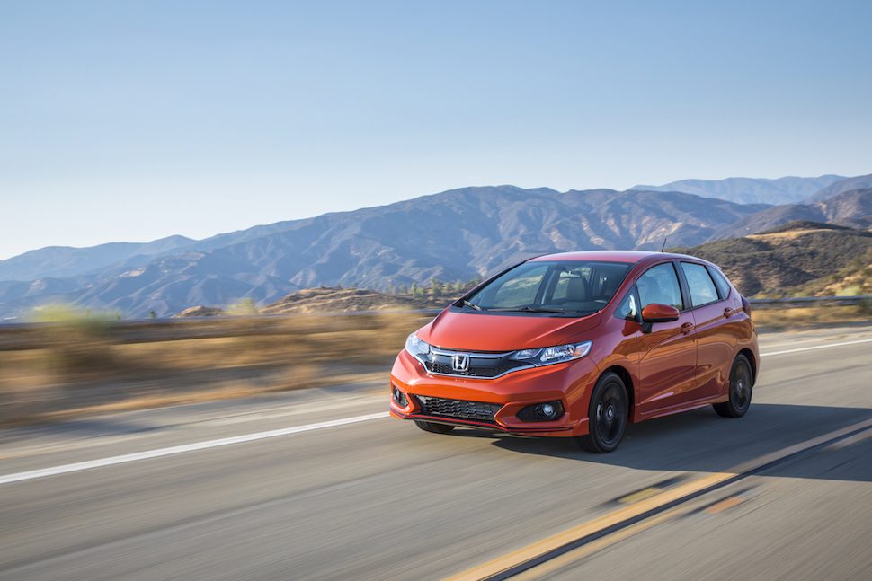 2018 Honda Fit Sport orange rolling in the mountains