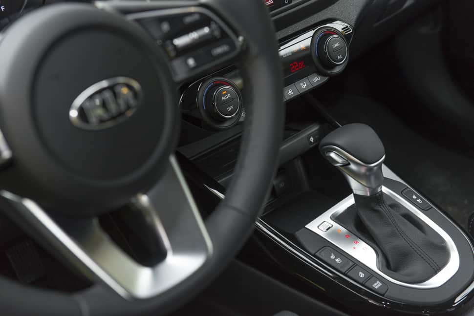 2019 Kia Forte review steering wheel and shifter