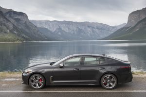 2018 Kia Stinger GT side profile parked in mountains