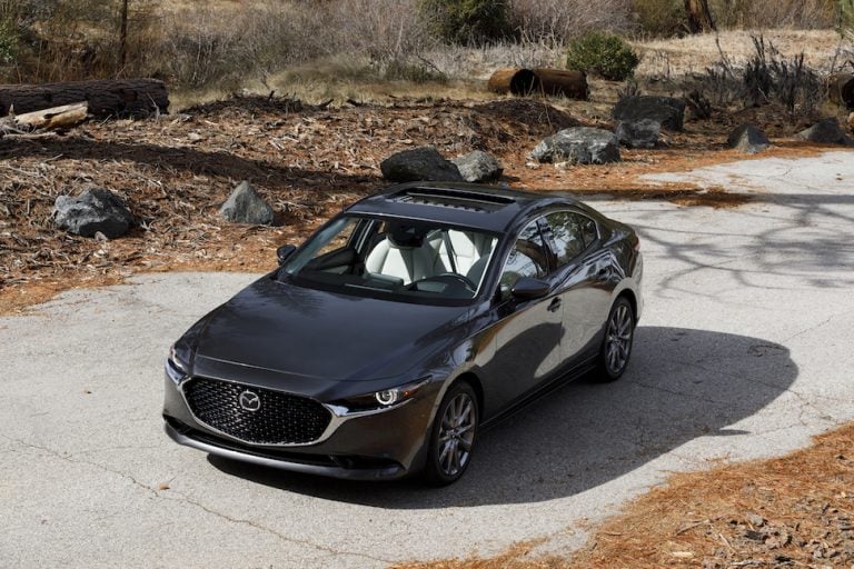 2019 mazda3 sedan top view in grey in a forest