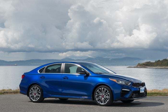 2020 Kia Forte GT front view blue car by ocean
