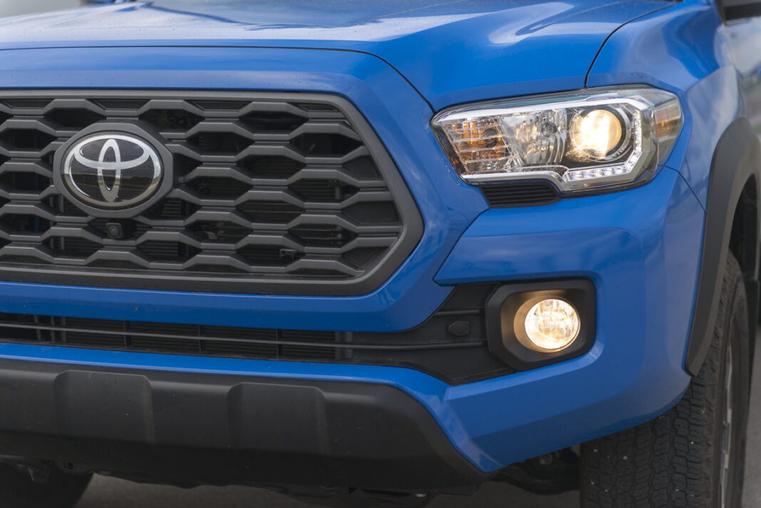 2020 Toyota Tacoma TRD Off-Road front grill, fog lamps, and headlights up close
