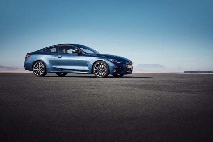 2021 BMW 4 Series Coupe in blue parked outside against blue sky