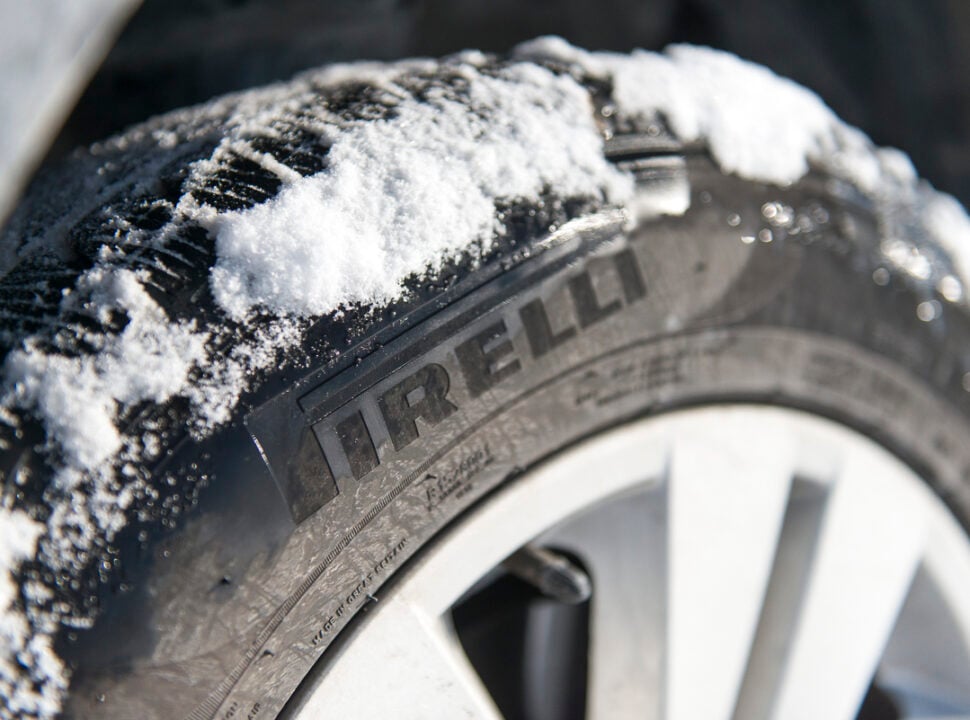 Pirelli Scorpion Winter Tire logo on tire sidewall with snow on tread