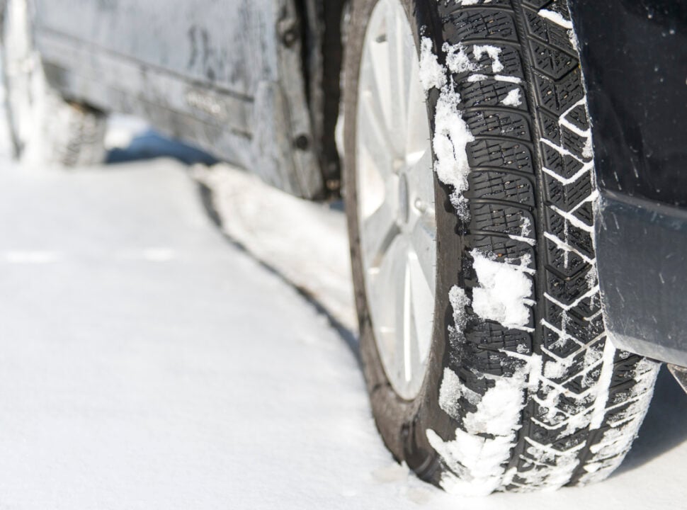 Pirelli Scorpion Winter Tire on Subaru Outback close up shot of tread in the snow