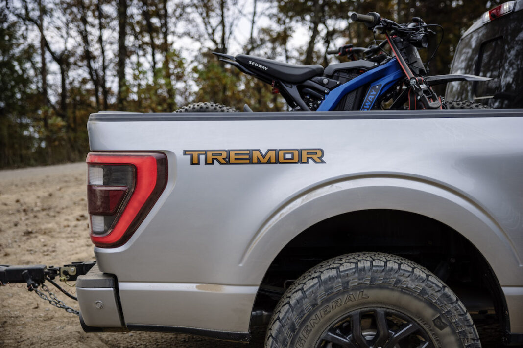 2021 Ford F-150 Tremor logo at back and dirt bikes in bed