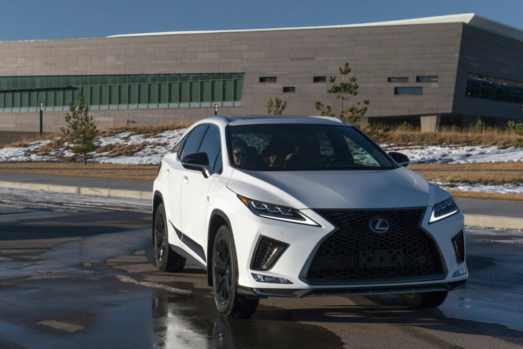 Lexus RX 350 Black Line in white parked outside by building