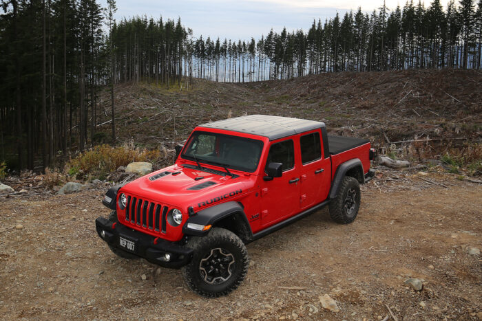 2021 Jeep Gladiator Rubicon in red parked in forest