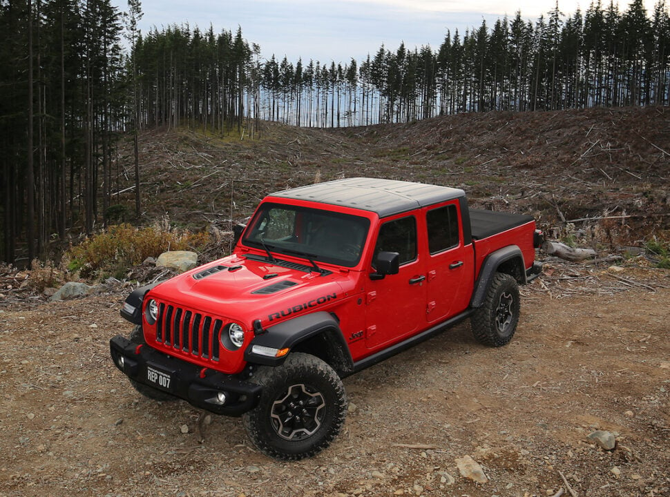 2021 Jeep Gladiator Rubicon in red parked in forest