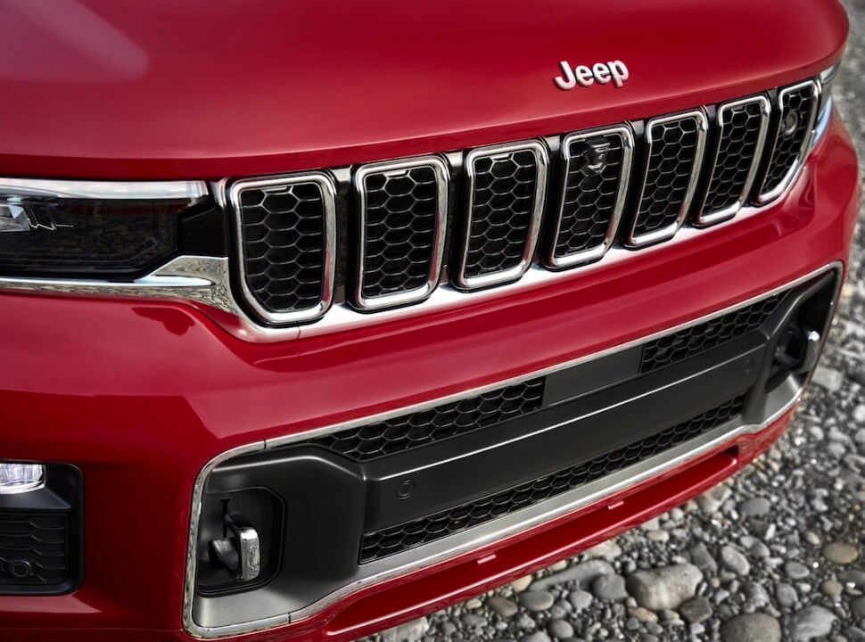 All-new 2021 Jeep® Grand Cherokee L Overland refined front view with a new front fascia designed for function while keeping the competitive approach angle for which the Grand Cherokee is known.