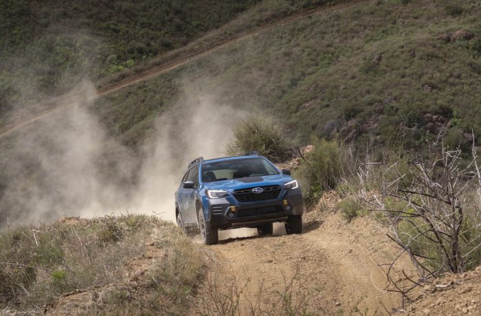 2022 Subaru Outback Wilderness SUV off roading up a dirt road