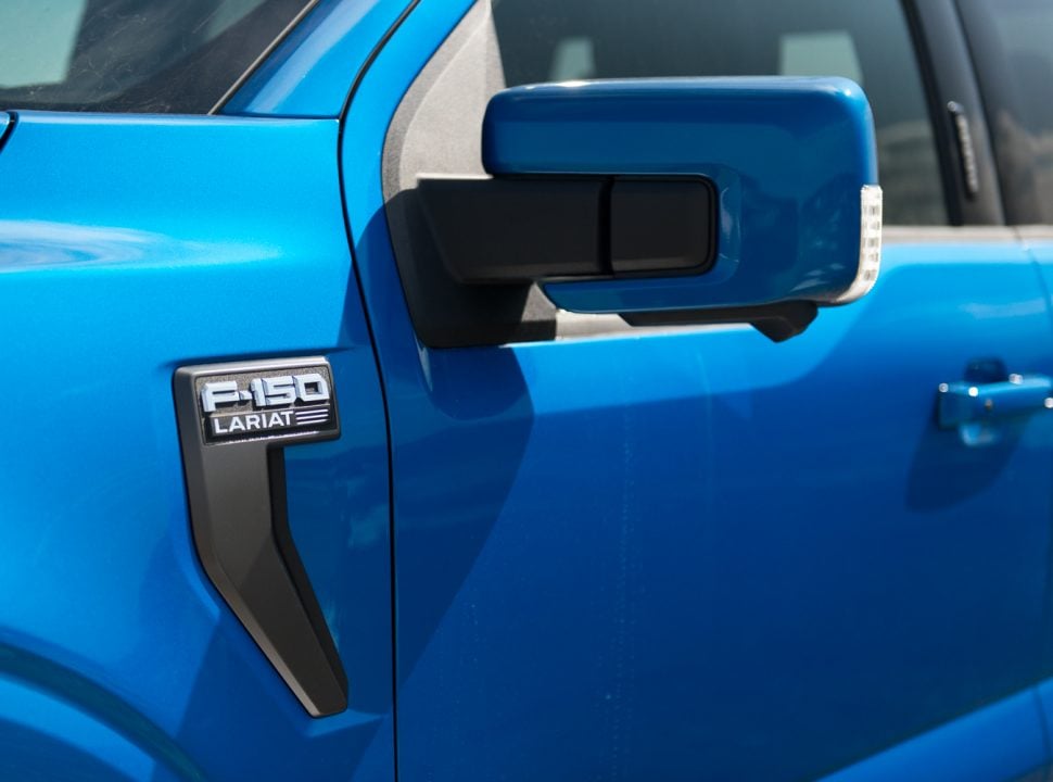 2021 F-150 Hybrid Lariat in blue side mirror and badging