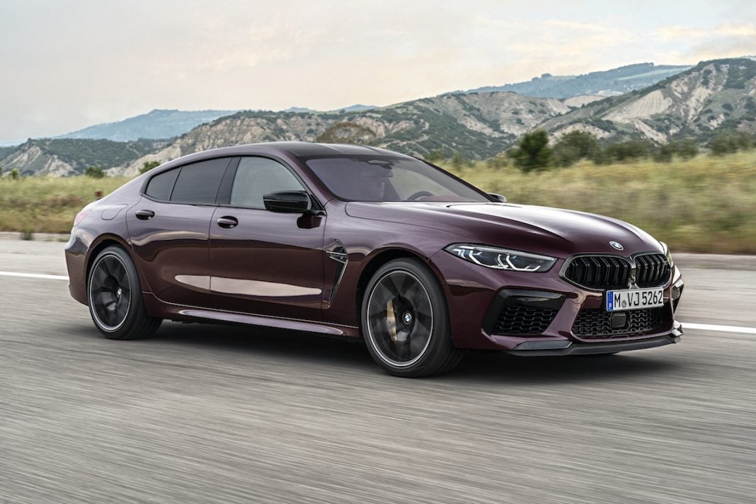 2021 BMW M8 Gran Coupe Competition front driving on road