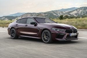 2021 BMW M8 Gran Coupe Competition front driving on road