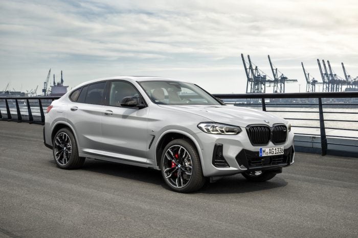 2022 BMW X4 M40i front view parked on street by the water