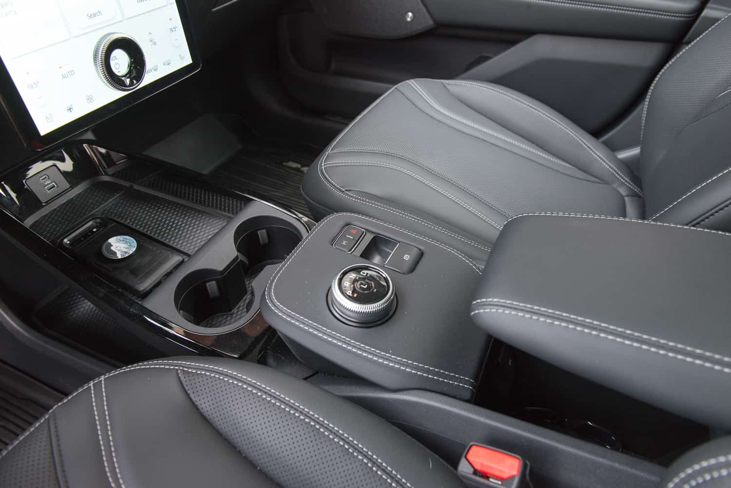 2021 Ford Mustang Mach-E Premium interior centre area and seat bottoms in black leather and white stitching