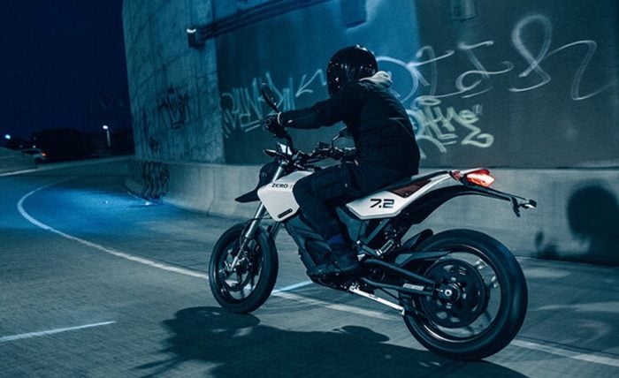 Zero Motorcycles FXE rear view riding at night on street