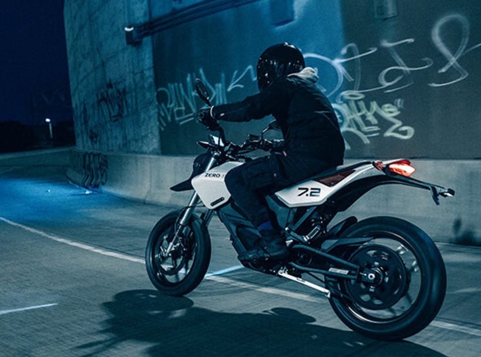 Zero Motorcycles FXE rear view riding at night on street