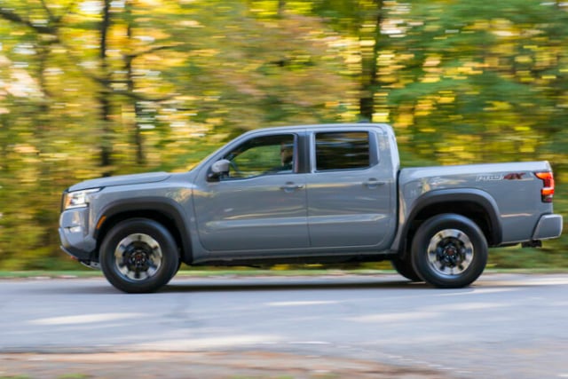 2022 Nissan Frontier grey sideview driving