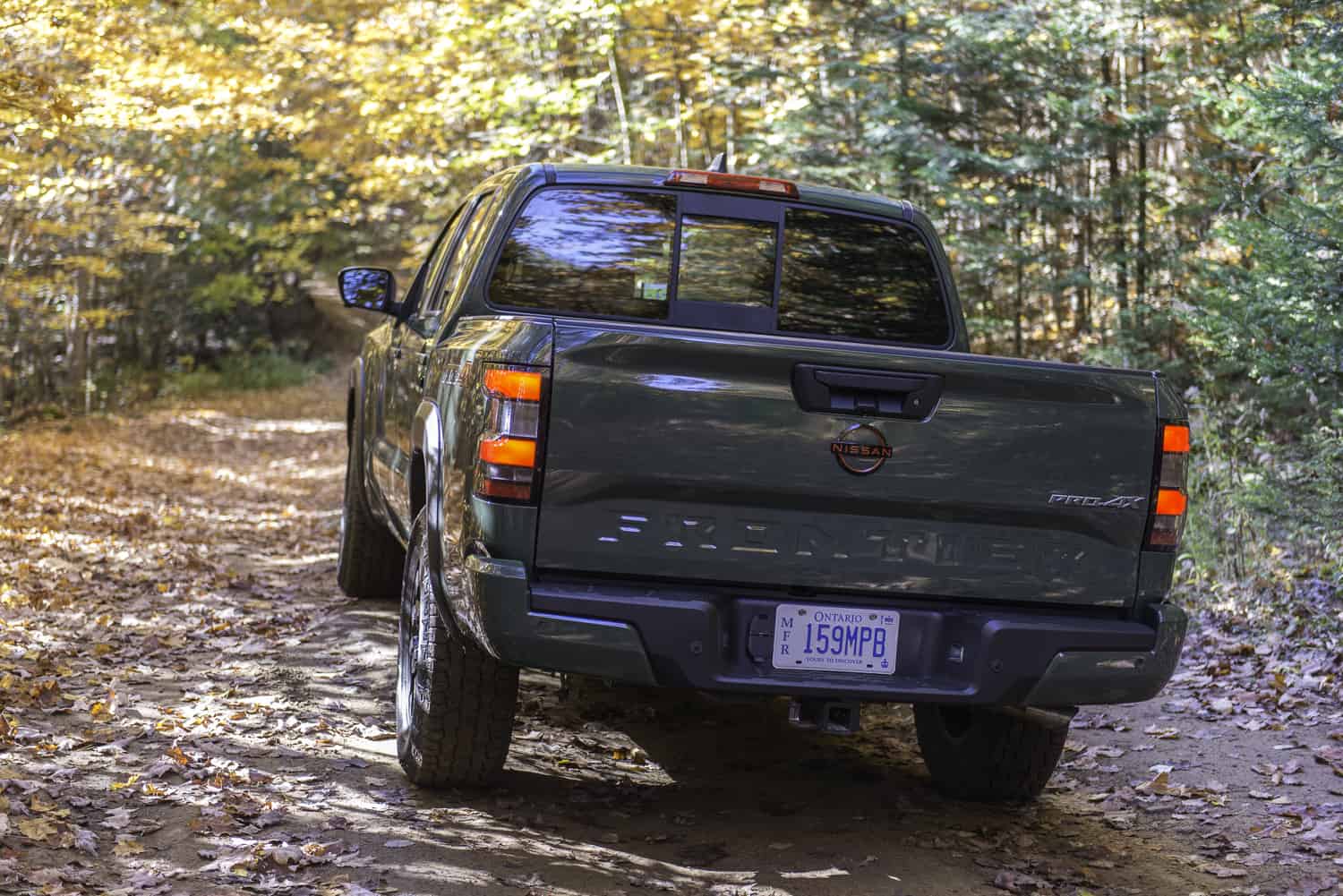 2022 Nissan Frontier green rear view