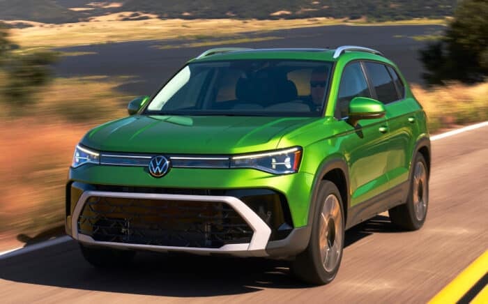 2026 Volkswagen Taos green front driving